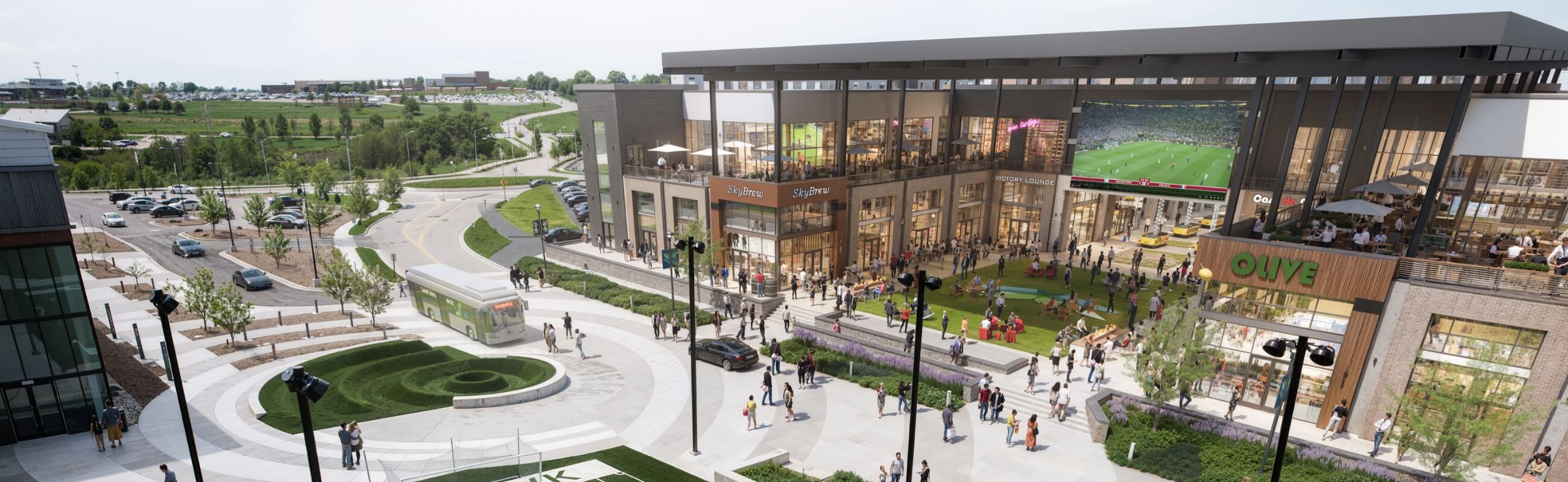 Bluhawk mixed-use development with outdoor gathering space and soccer field