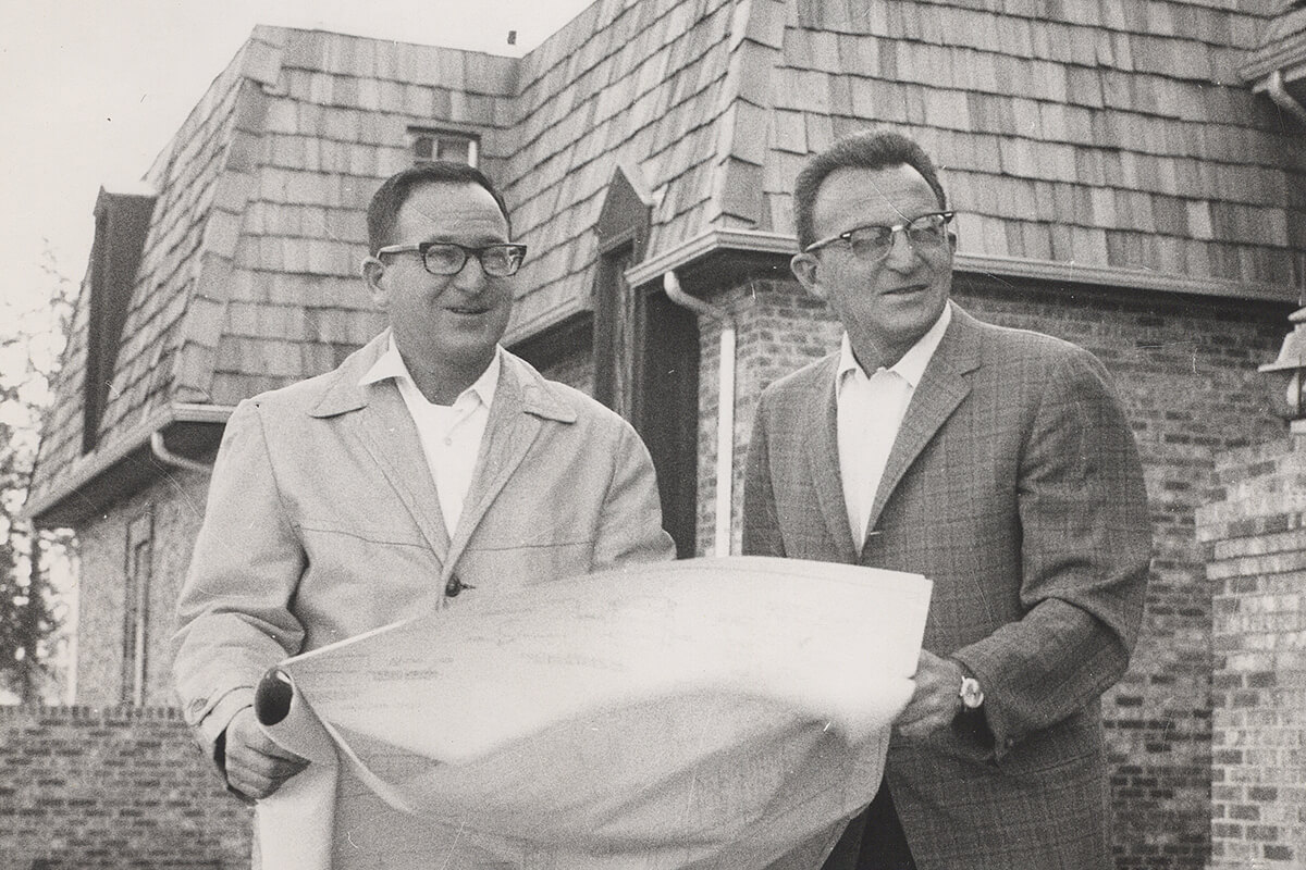 sam and isaac price holding prints